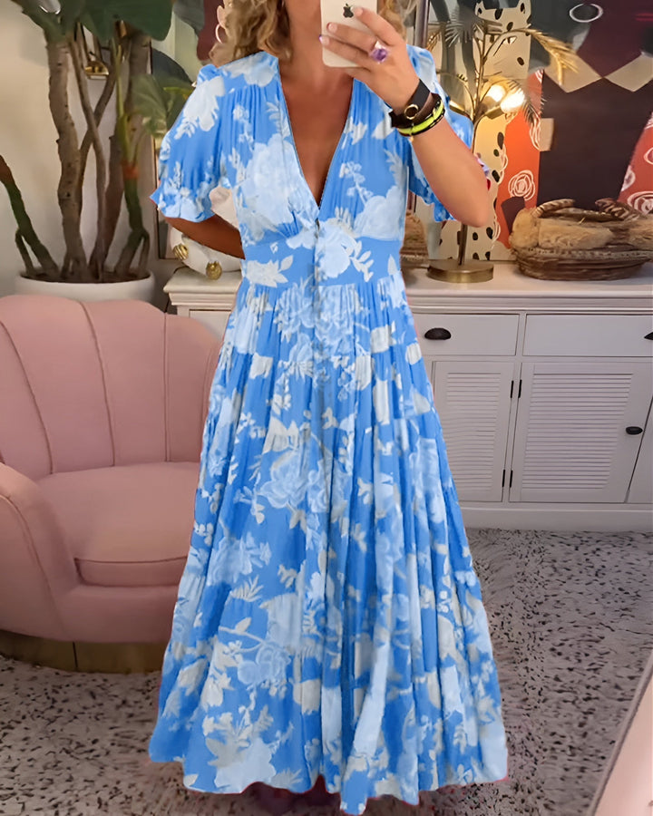 CARINE | ABITO CON TASCHE E SCOLLATURA A V IN STAMPA FLOREALE