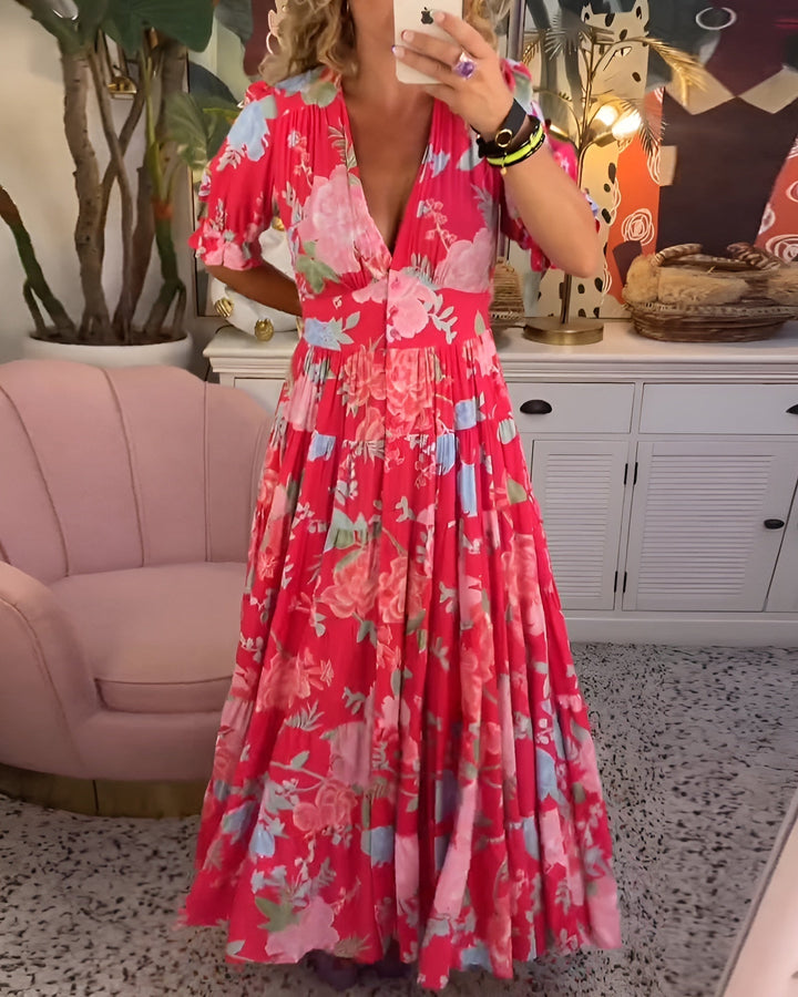 CARINE | ABITO CON TASCHE E SCOLLATURA A V IN STAMPA FLOREALE