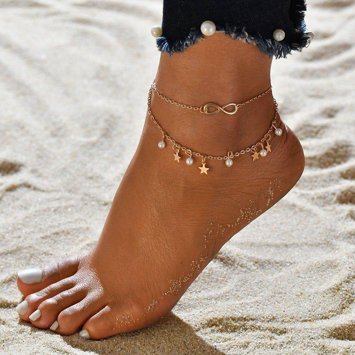 BRENDA™ - Bracciale Cavigliera Infinity + Perle e Stelle